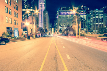 Wall Mural - Light trails and office buildings at North LaSalle Street bridge in downtown Chicago at night