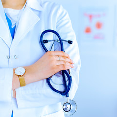 Doctor holds a stethoscope in. office in the hospital. Medicine concept