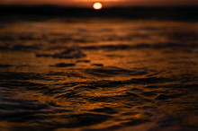 Sunset Over The Orange Sea