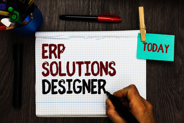 Conceptual hand writing showing Erp Solutions Designer. Business photo text elegant optimized modularised and reusable possible Register pages handwriting text work stationery items woody table