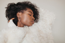 Sensual Black Woman In White Fur