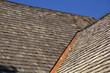 © Martina Simonazzi - new wood shingle roof with copper gutter, wood shingles on a roof top of an old hut in bavaria