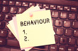 © Artur - Conceptual hand writing showing Behaviour. Business photo text way in which one acts conducts oneself especially towards others Blank Notepad Sheet with Push Pin for Reminding on Laptop keyboard
