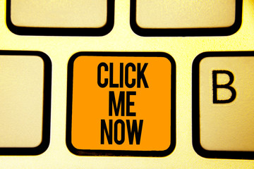 Text sign showing Click Me Now. Conceptual photo Internet helping desk Press the button Online Icon Nertwork Keyboard orange key Intention create computer computing reflection document