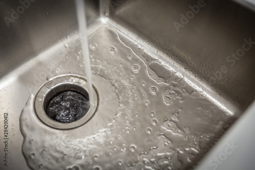 Cuadros en Lienzo Stainless kitchen sink with food waste disposal in modern home