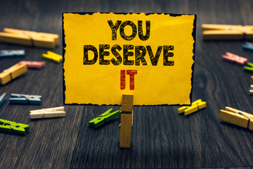 word writing text you deserve it. business concept for reward for something well done deserve recogn