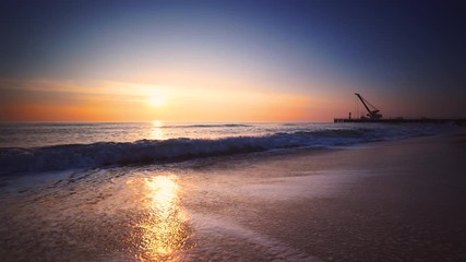 Wall Mural - Beautiful morning on the beach. Sea sunrise