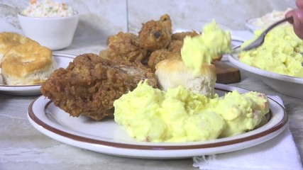 Canvas Print - Taking a forkful of potato salad in slow motion