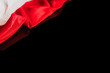 Polish flag on a black background with reflection