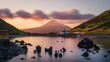 Colourful Sunrise in Horta, Faial Island: long Exposure of the Porto Pim Beach, the Whaling Station and the Pico Volcano Mountain in the background, Azores Islands, Portugal.