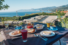 Breakfast Table With A View Over The Orosei Coast At Cala Gonone Sardinia Italy, 