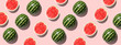 Colorful fruit background of fresh half watermelon on pink background