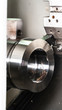 © barkn - The CNC lathe machine chucking the metal shaft.The turning machine cutting forming cutting the metal shaft