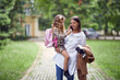 © luckybusiness - busy mom walking with her daughter after school