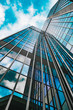 © EwaStudio - background of modern glass building skyscrapers