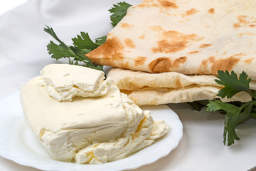 Wall Mural - Fresh cottage cheese and pita bread