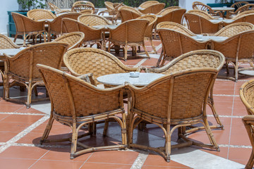 Poster - Rattan table and chairs in beach cafe next to the red sea in Sharm el Sheikh, Egypt