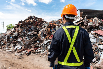 Recycling industry a worker who recycling thing on recycle center