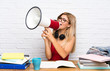 © luismolinero - Teenager student girl at indoors shouting through a megaphone