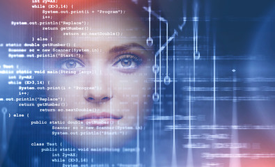 Young woman looking forward, lines of code