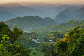 Poster - Myanmar. Shan State. Near Kalaw. Sunset over the ridges of haze-filled hills.