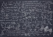 © Ravil Sayfullin - Black chalkboard with Maths and science sketches
