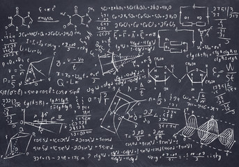 black chalkboard with maths and science sketches