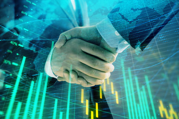 Multi exposure of forex graph and world map on abstract background with two businessmen handshake. Concept of success on international markets