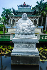 Canvas Print - Buddhist statue before the Taoist temple in Davao, Mindanao, Philippines