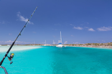 Wall Mural - Bahamas, Exuma Island, Cays Land and Sea Park. Moored sailboats and fishing rod. Credit as: Don Paulson / Jaynes Gallery / DanitaDelimont.com