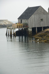 Sticker - Canada, Nova Scotia, Peggy's Cove. Lobster traps on typical wooden dock.