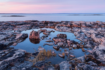 Sticker - Canada, Nunavut, Territory, Setting midnight sun lights clouds above rocky coastline of Harbour Islands along Hudson Bay near Arctic Circle