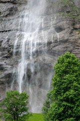 Wall Mural - Staubbach waterfall in Interlaken valley, Switzerland