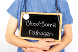 Fototapeta Perspektywa 3d - Doctor shows information on blackboard: blood-borne pathogen.  Medical concept.