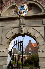 Canvas Print - The Netherlands (aka Holland), West Friesland, Hoorn. Courtyard gate with city crest above door.