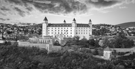 Poster - Bratislava castle over Danube river after sunset in the Bratislava old town, Slovakia