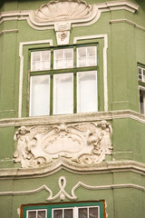 Canvas Print - Romania, Sibiu. Detail of a building exterior, Old Town. 