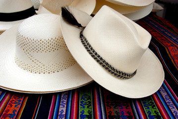 Canvas Print - Ecuador, Manta. Small town of El Aromo where the raw material, straw aka Paja Toquilla, is processed to make the world famous Panama hats. Finished hats ready for sale.