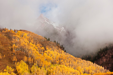 Wall Mural - USA, Colorado, Aspen. Storm clouds among mountains in the Maroon Bells-Snowmass Wilderness Area. 