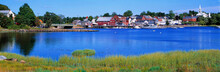 USA, Maine, Damariscotta. The Quaint Village Of Damariscotta, In Lincoln County, Maine, Is A Montage Of Bright Red And White Buildings On Its Pretty Blue Harbor.