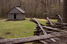 USA, Tennessee, Great Smoky Mountains National Park. Abandoned Cabin And Old Wooden Rail Fence.