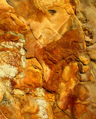 USA, Oregon, Harris Beach SP. Orange and cinnamon colored rocks at Harris Beach State Park form a collage of shapes and textures, Oregon.