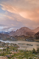 Poster - USA, Wyoming, Bridger National Forest, Bridger Wilderness. Sunset on Wind River Range and Island Lake with tent in foreground. 