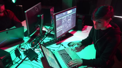 Hackers making cryptocurrency fraud using virus software and computer interface. Blockchain cyberattack, ddos and malware concept. Underground office.