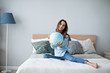© BestForYou - Happy woman holding a globe, indoor.