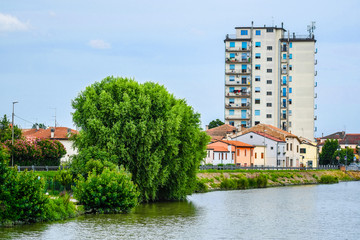 Wall Mural - Este, Italy - July, 16, 2019: Landscape with the image of channel in Este, Italy