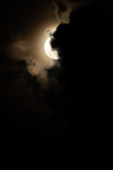 Wall Mural - Moon light behind cloud