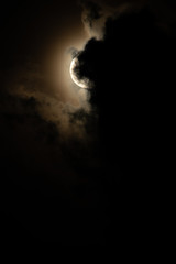 Wall Mural - Moon light behind cloud