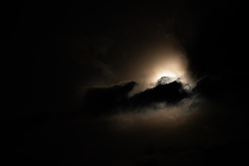 Wall Mural - Moon light behind cloud
