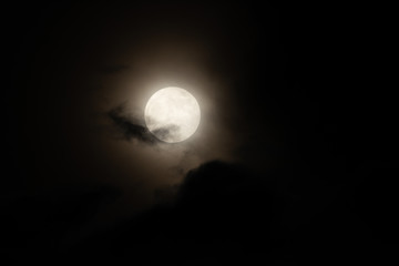 Wall Mural - Moon light behind cloud